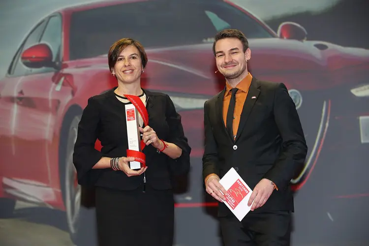 Roberta Zerbi, Head of EMEA Alfa Romeo Brand, receives the 